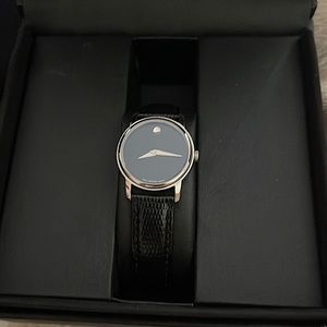 Women’s movado watch with diamond, black leather strap, never worn